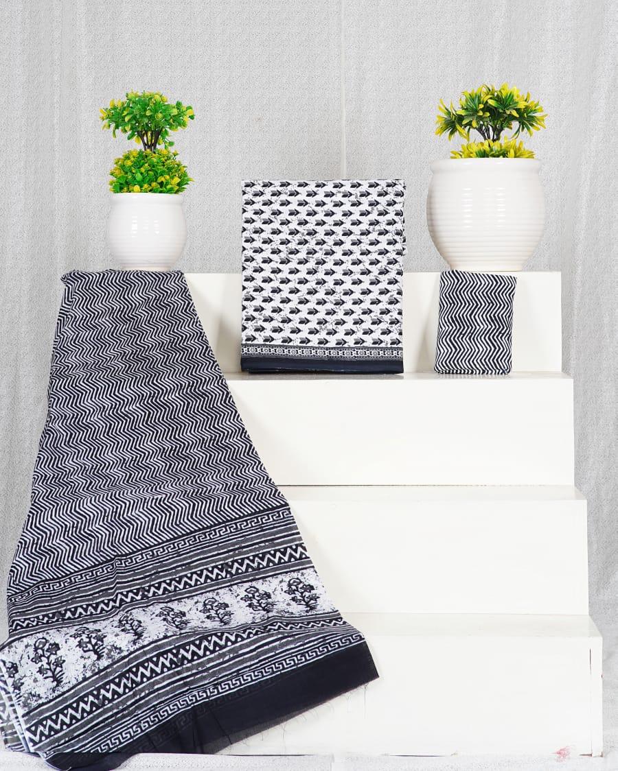 Off-White with Black,Grey floral motifs on the top