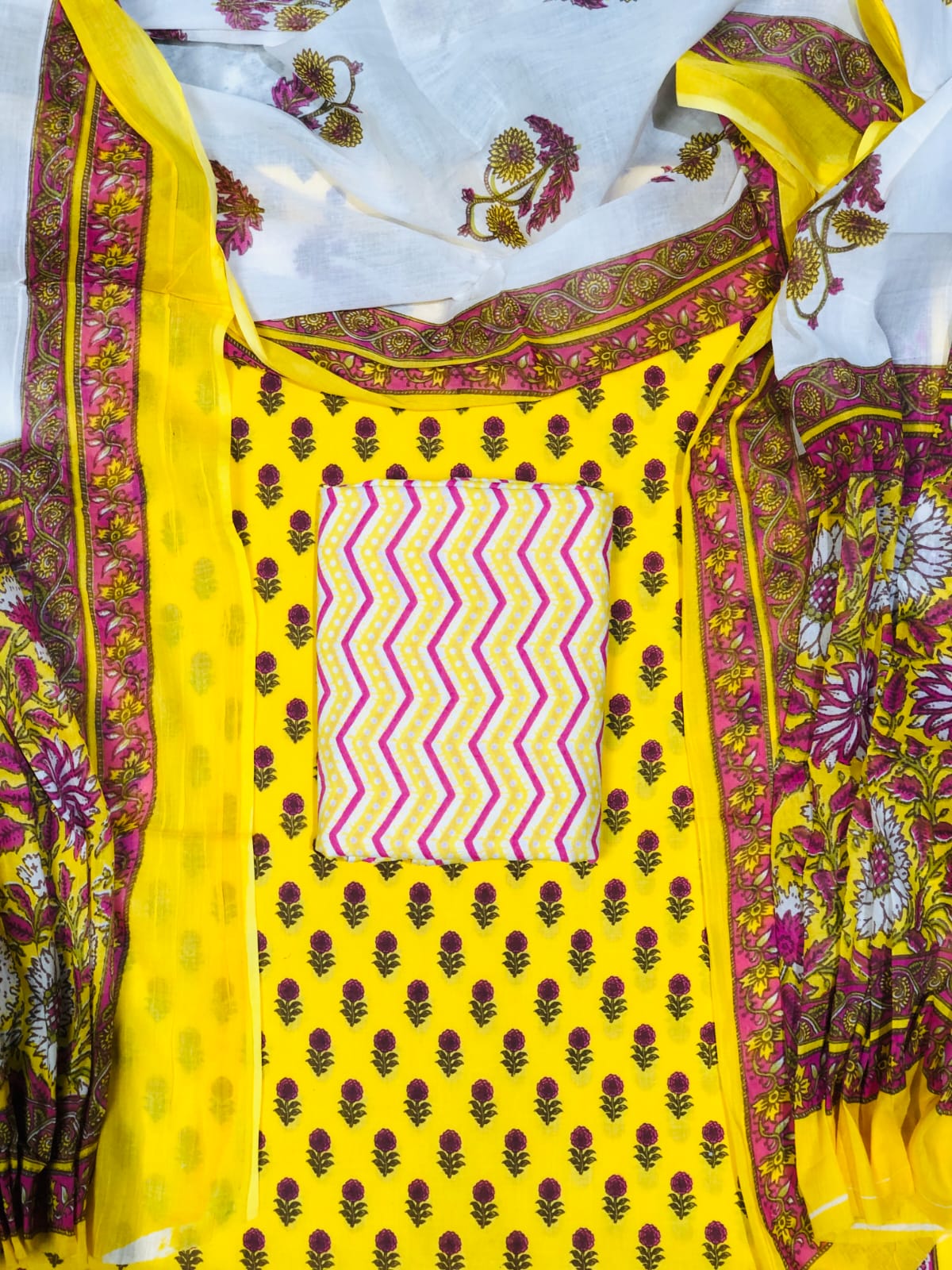 Yellow with Wine flower motifs on the cotton dress matrial