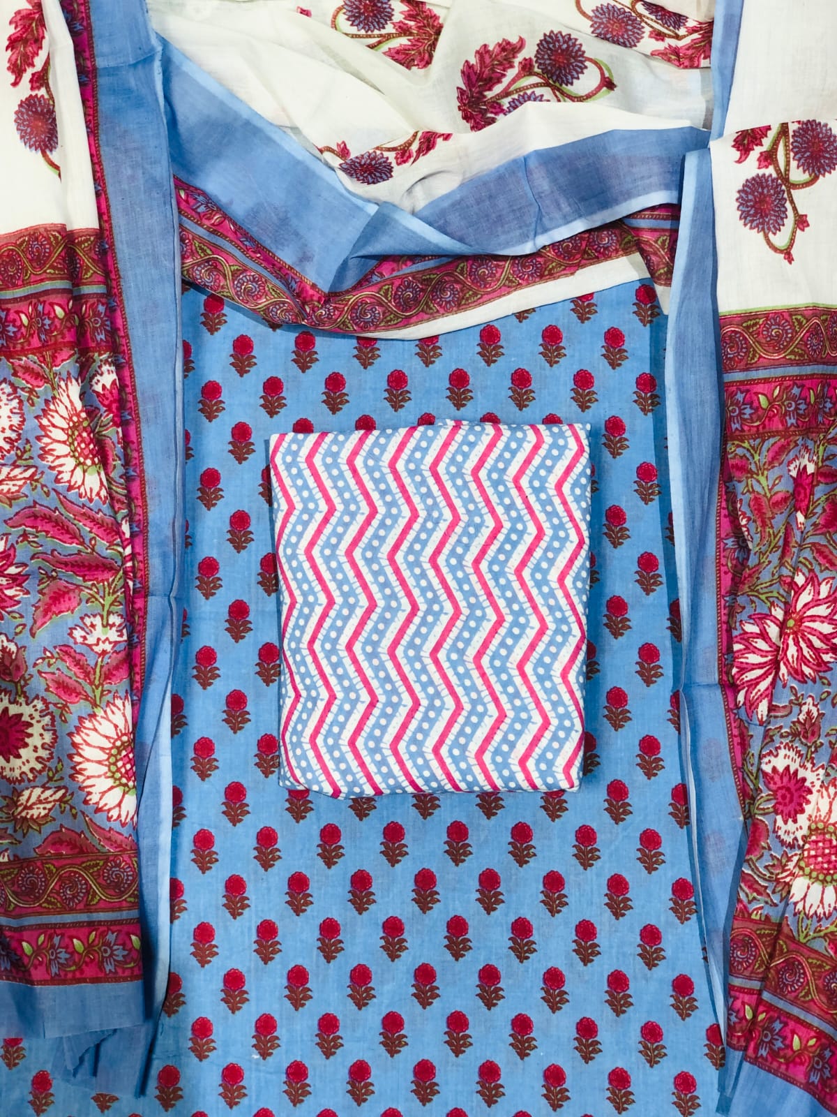 Cornflower Blue Green flower motifs on the cotton dress material