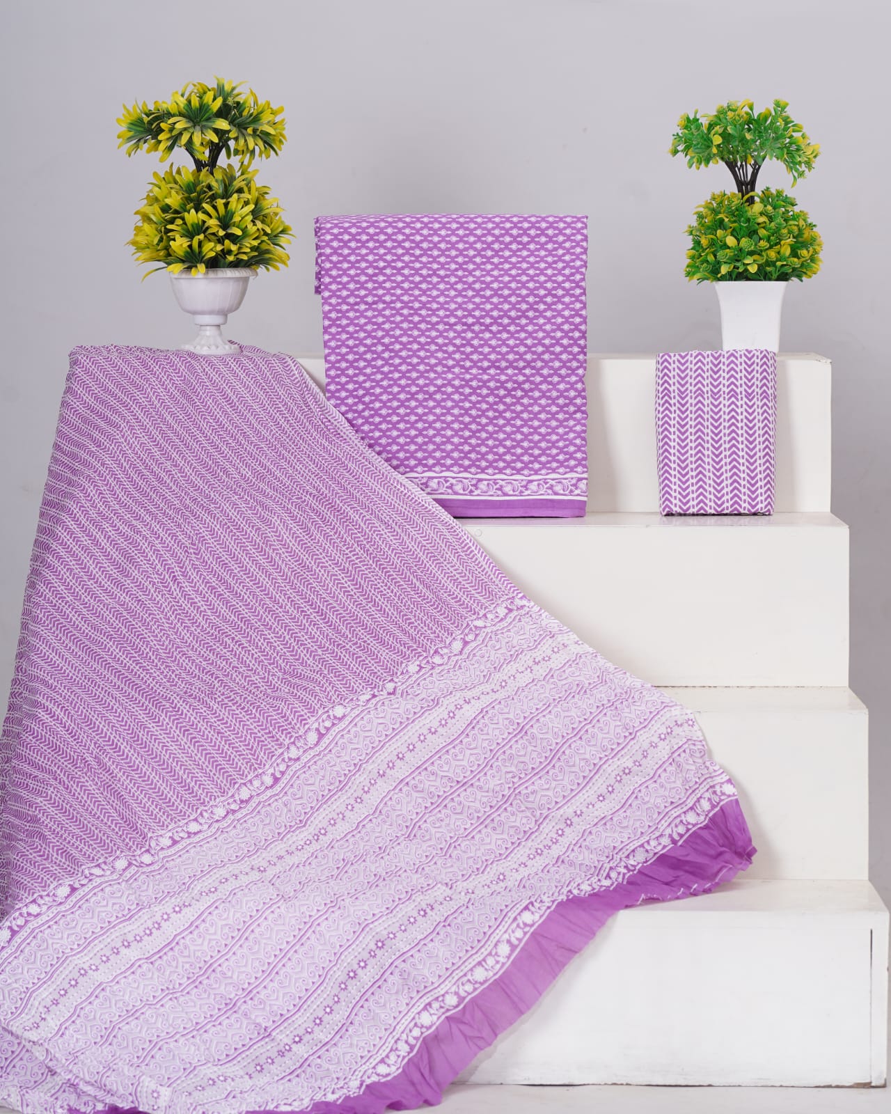 Lavender with White flower motifs on the cotton dress material