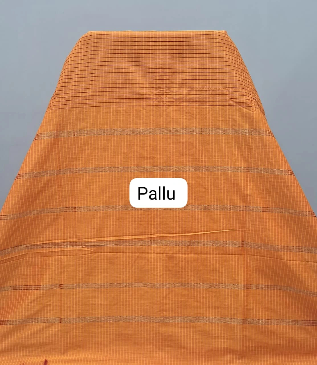 Light orange Arani cotton saree pallu