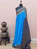 Graceful Cornflower Blue Plain Mysore Crepe Silk Saree 