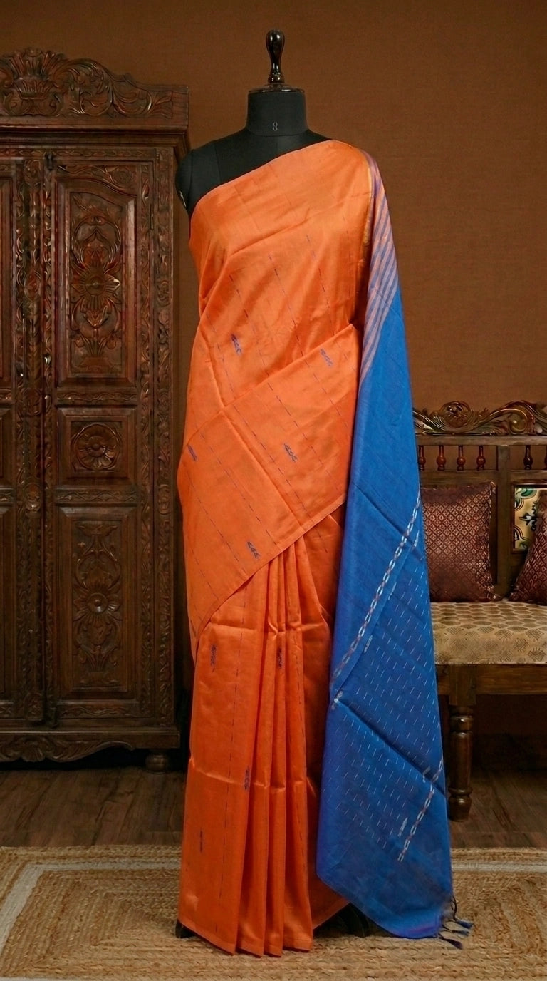An orange handwoven banana silk saree 