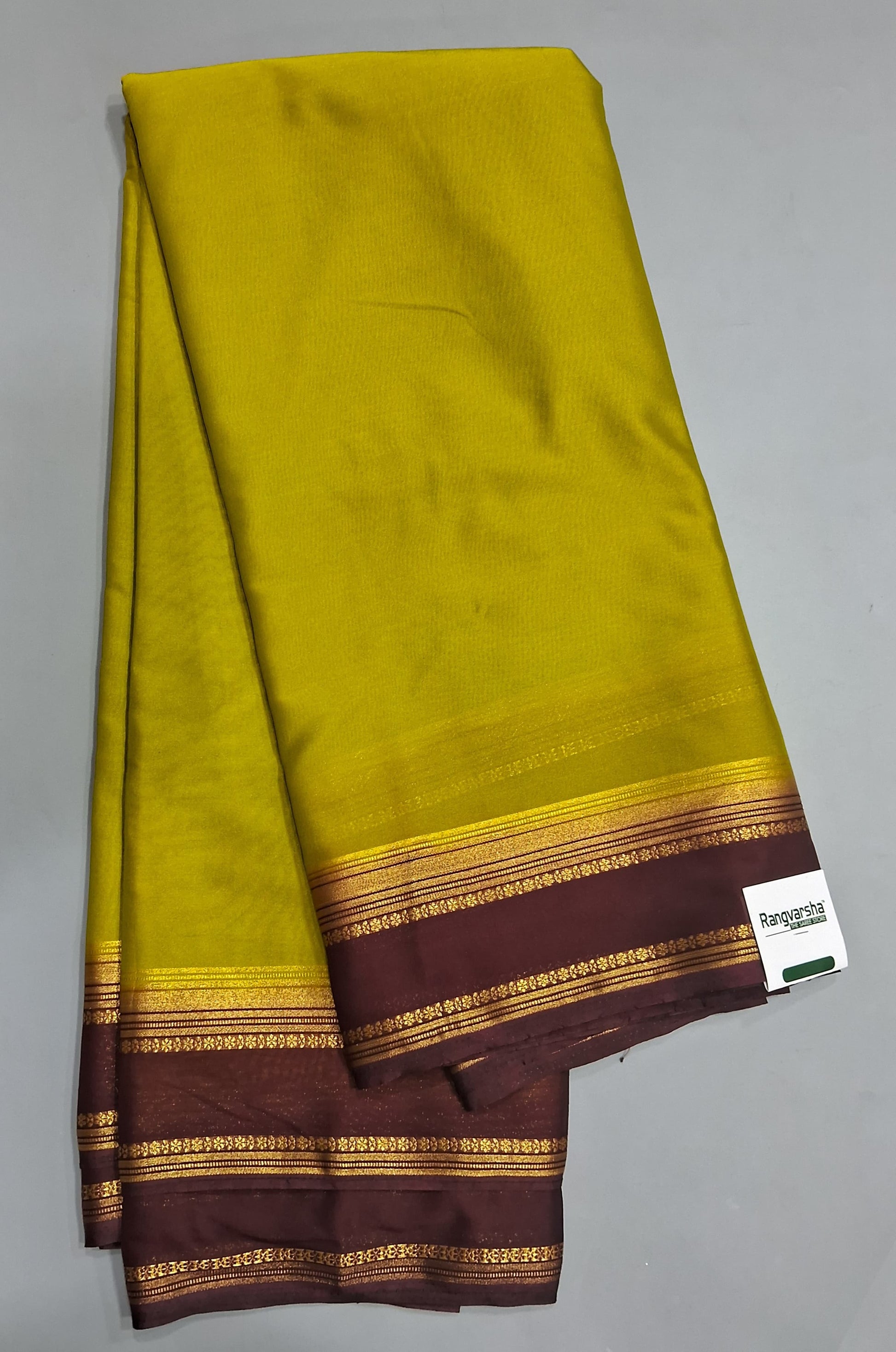 Parrot Green Plain Crepe Silk Saree