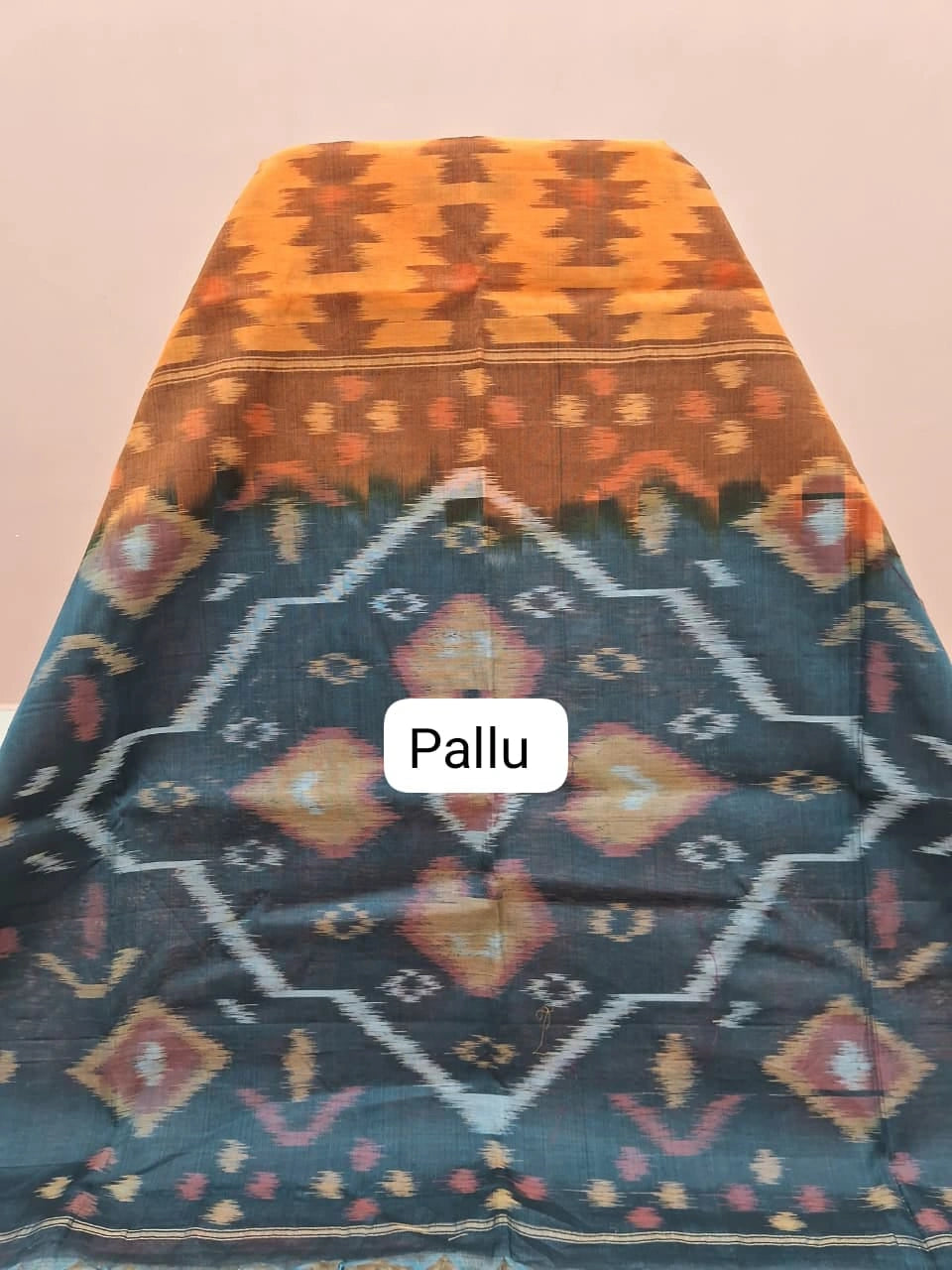 Light Orange Ikkat Silk Cotton Saree pallu