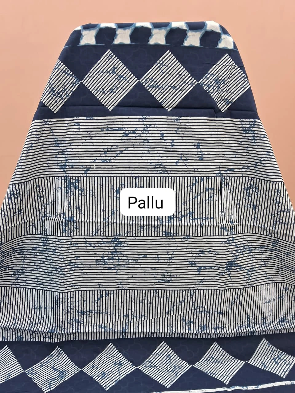 White and dark blue printed mulmul cotton saree pallu