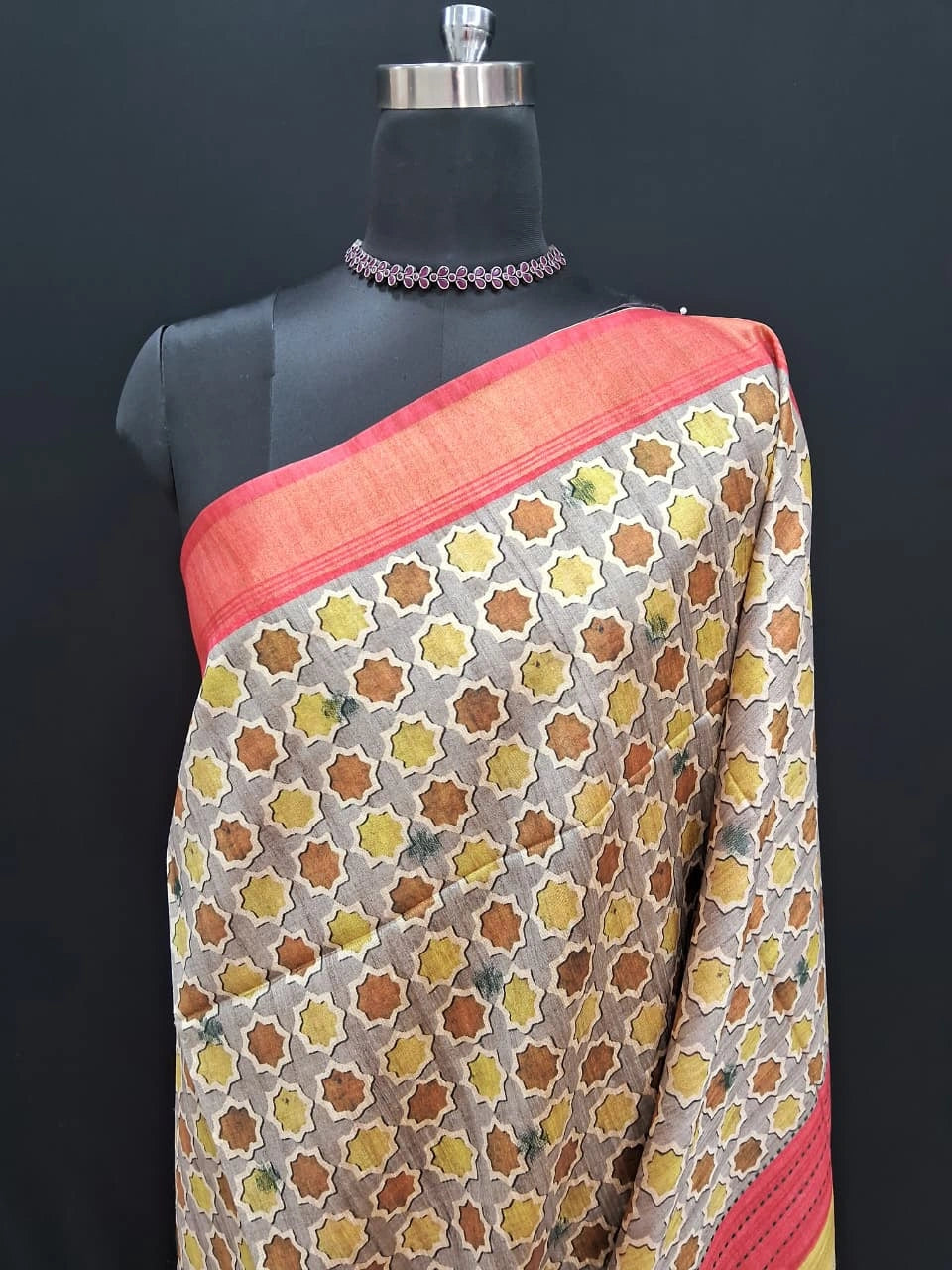 Grey Tussar Saree with ajrakh printed body with pink zari border