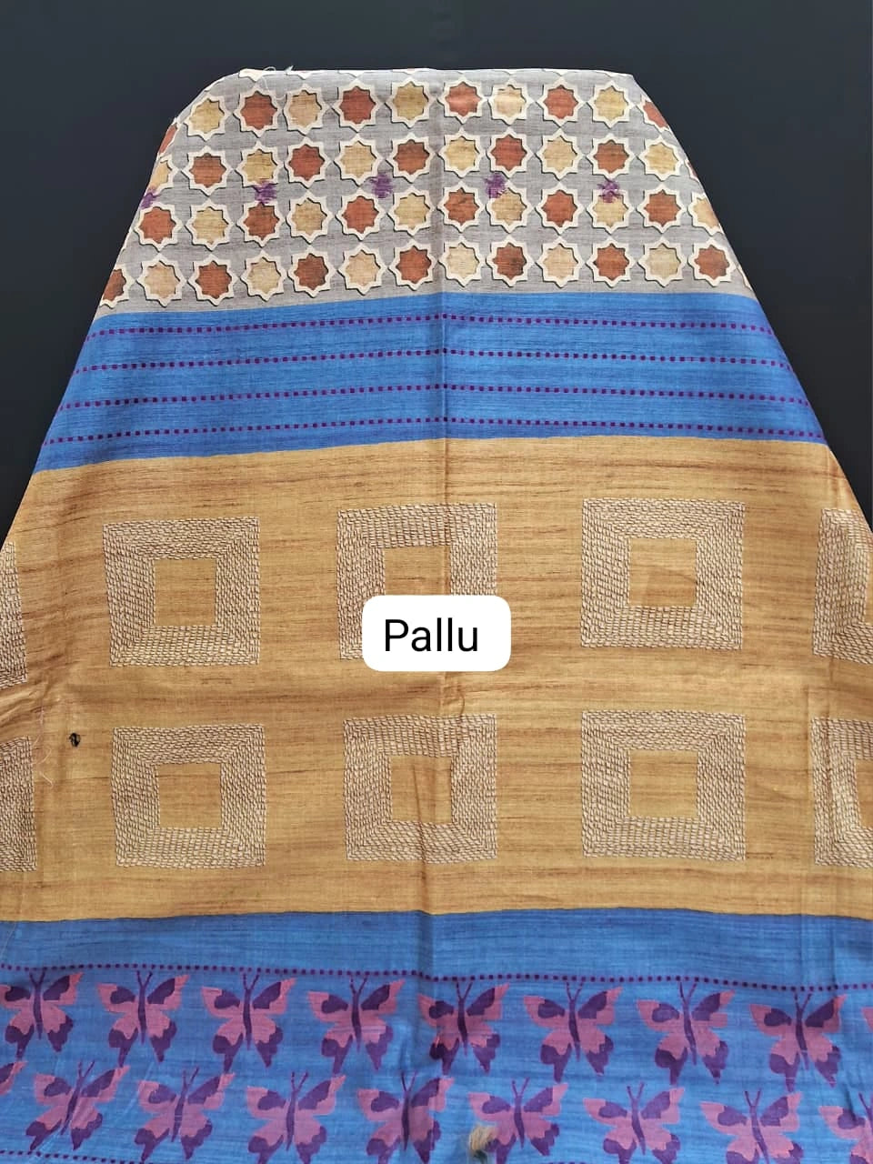 Grey Tussar Saree with ajrakh print with blue zari border pallu