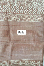 A brown Maheshwari silk saree pallu