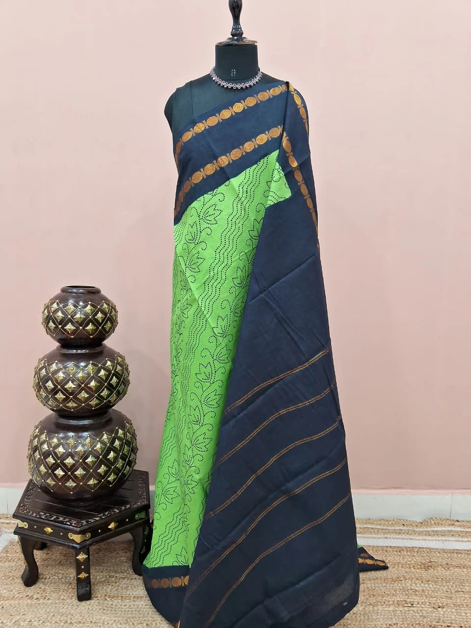 Vibrant bright green Sungudi cotton saree