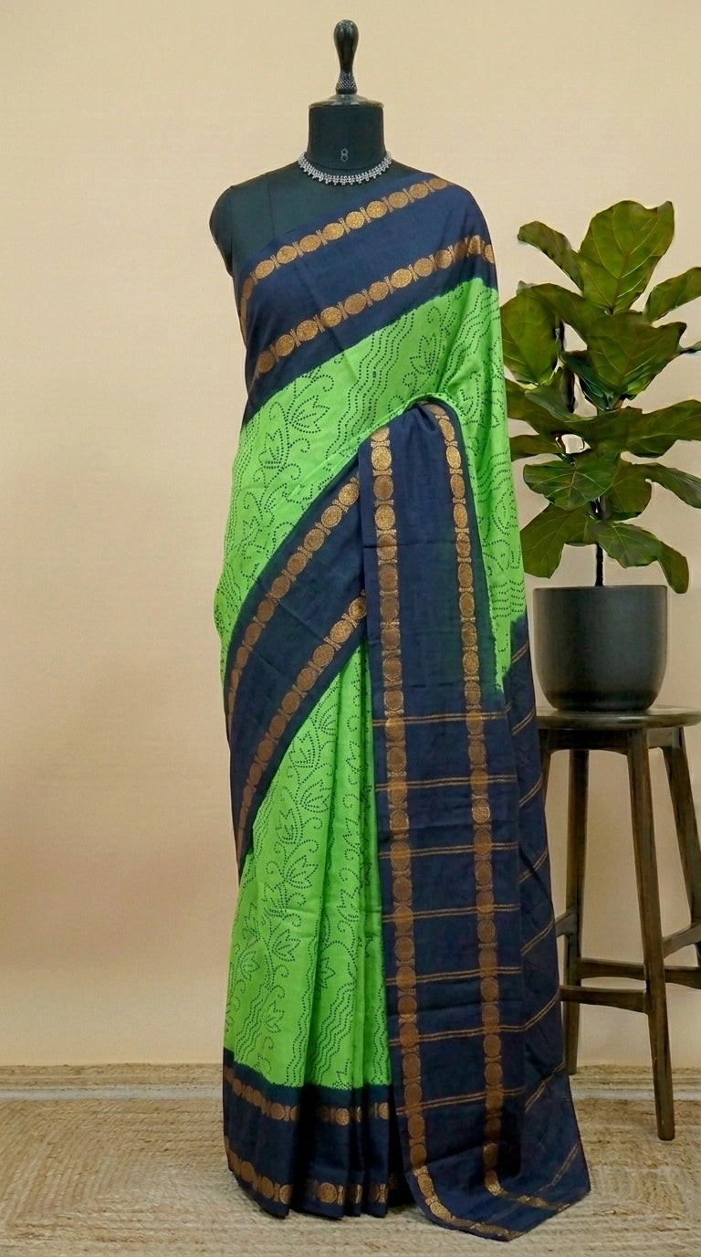 Vibrant bright green Sungudi cotton saree