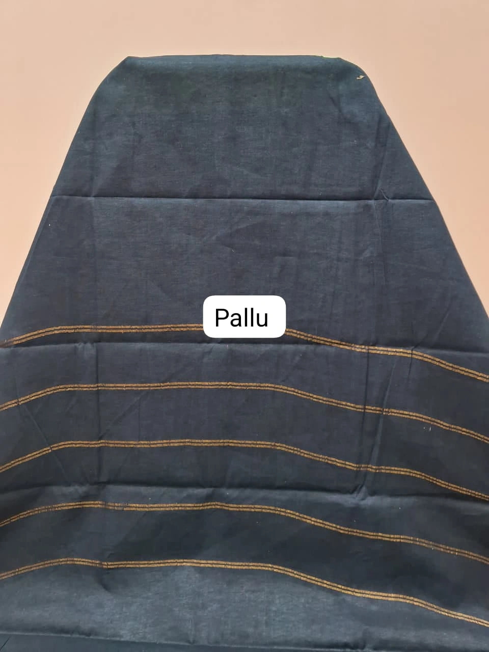 Vibrant bright green Sungudi cotton saree pallu