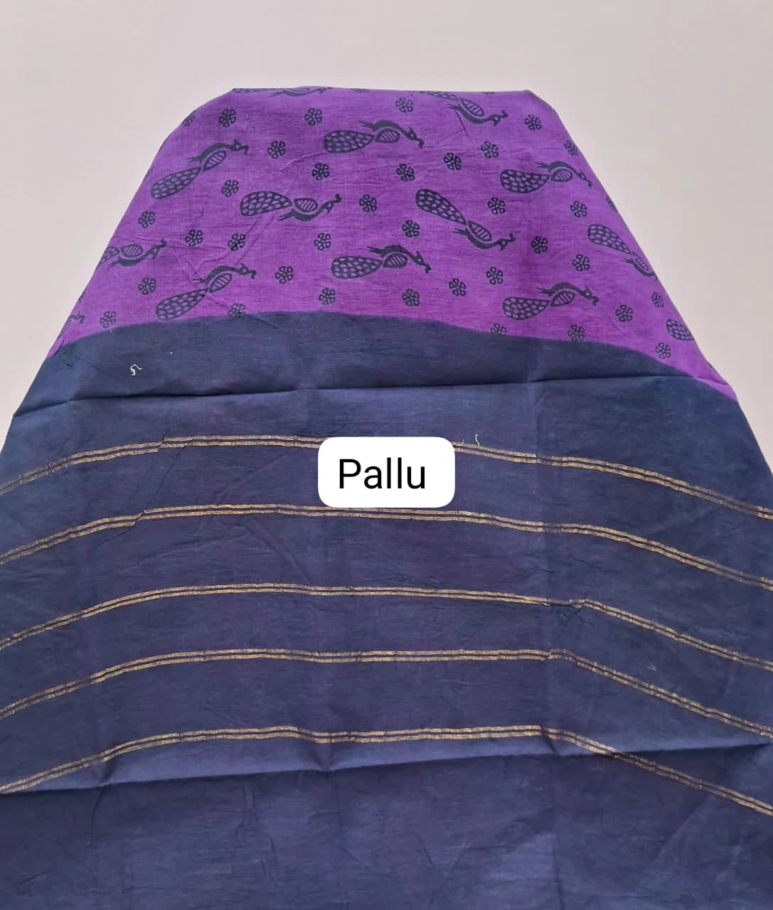 Elegant raspberry Sungudi cotton saree pallu