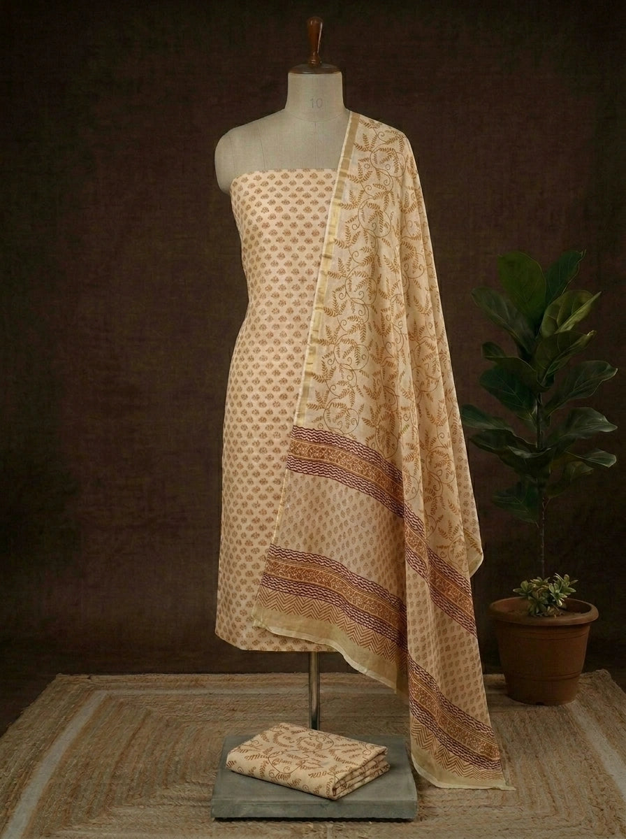 Cream with Brown flower motifs on the chanderi dress material online  