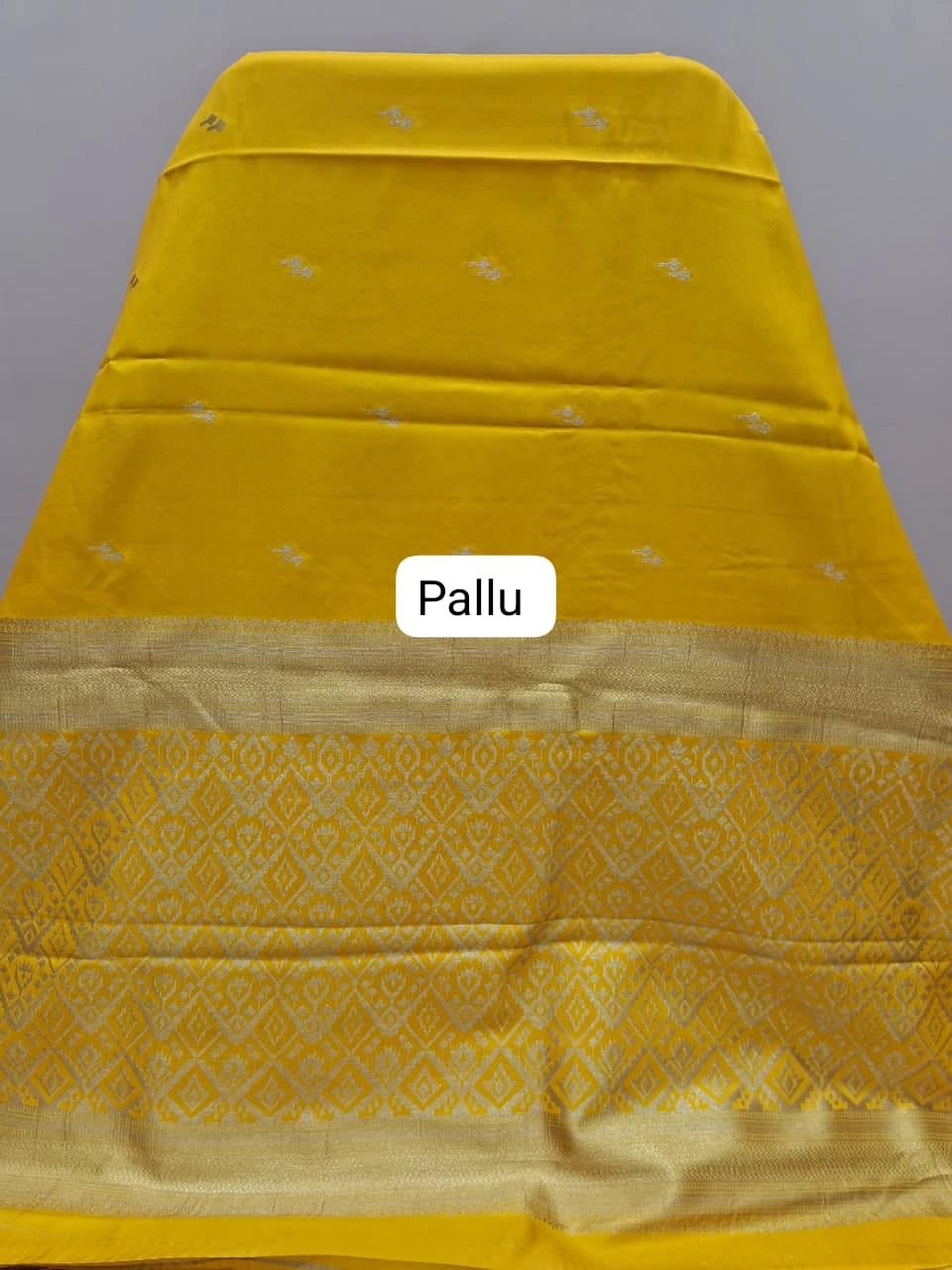 Mango yellow soft silk saree pallu