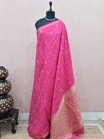 Pink soft silk saree Adorned with Zari 
