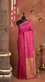 Pink soft silk saree Adorned with Zari