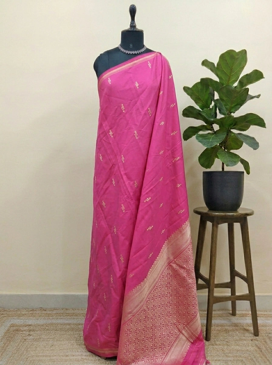 Pink soft silk saree Adorned with Zari