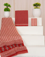 Red with Black, White motifs on the cotton dress material