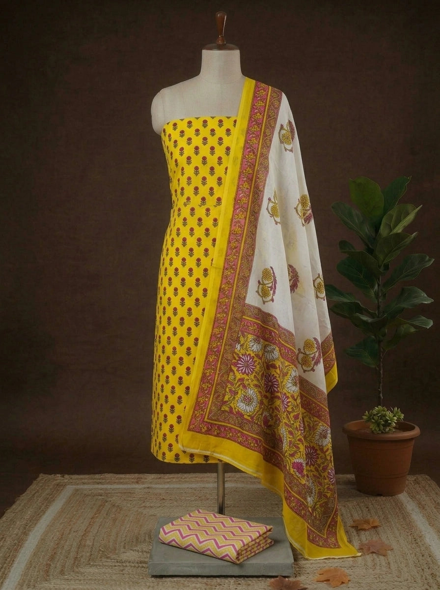 Yellow with Wine flower motifs on the cotton dress matrial