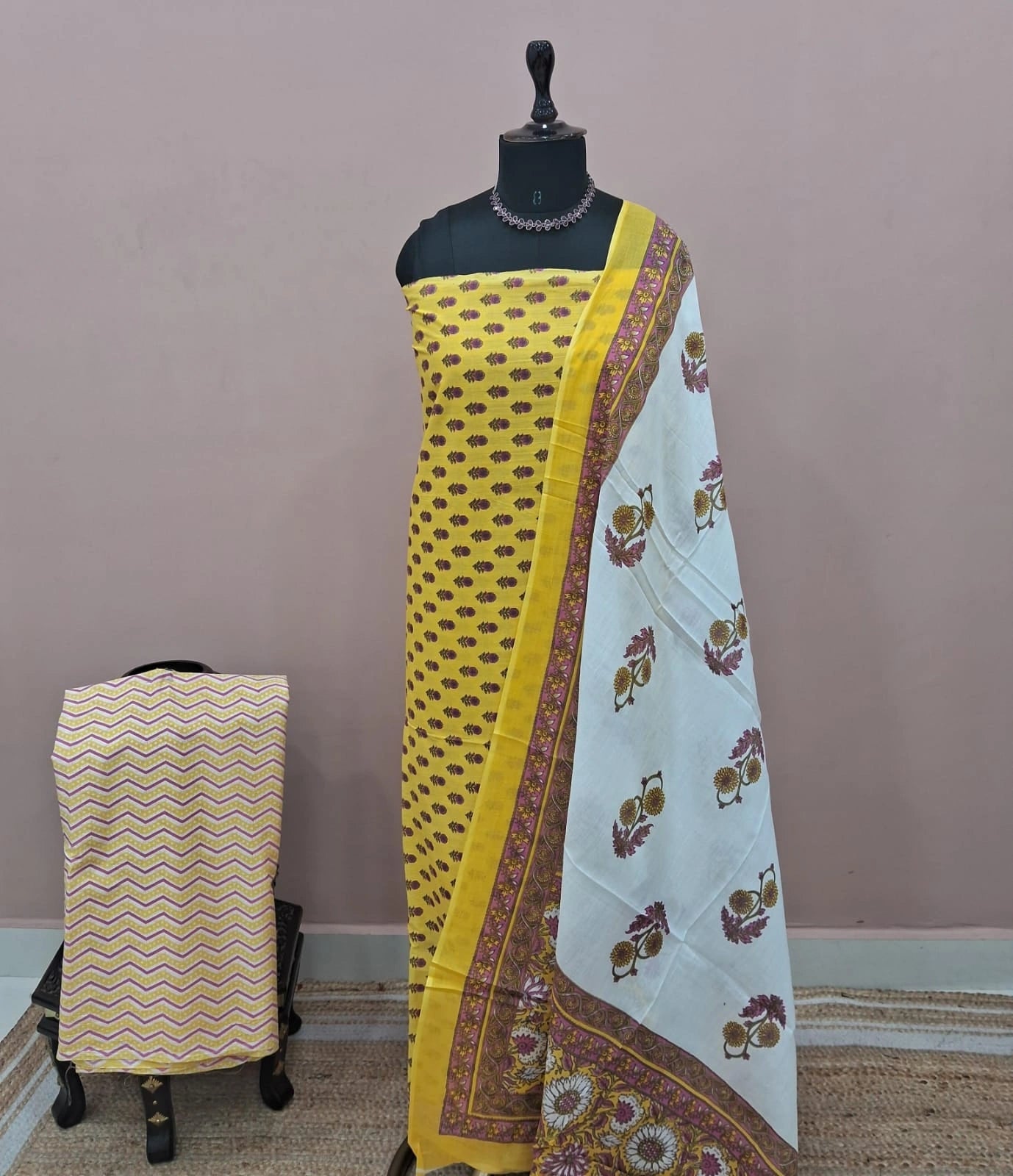 Yellow with Wine flower motifs on the cotton dress matrial