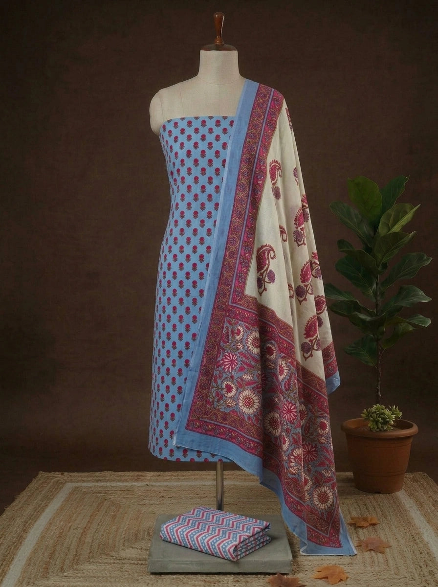 Cornflower Blue Green flower motifs on the cotton dress material