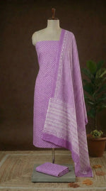 Lavender with White flower motifs on the cotton dress material