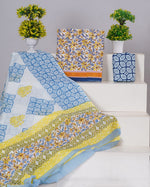 White and  Yellow flower printed cotton dress material