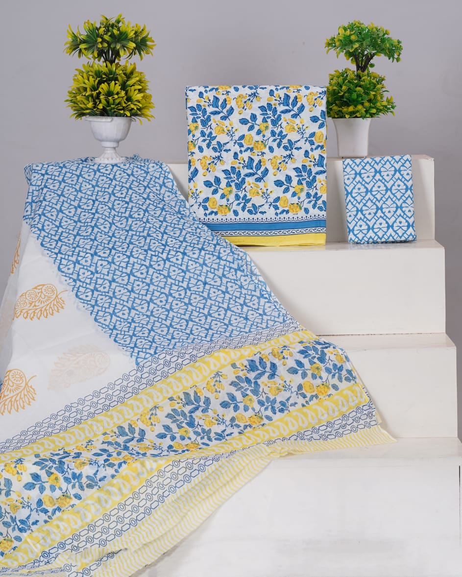 White with Yellow and Blue flower printed  cotton dress material