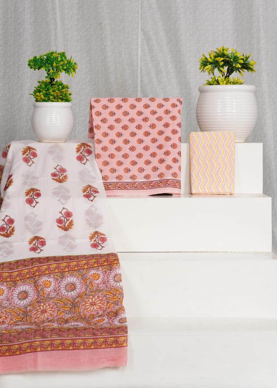 Peach with Yellow and Brown floral motis on the cotton dress material
