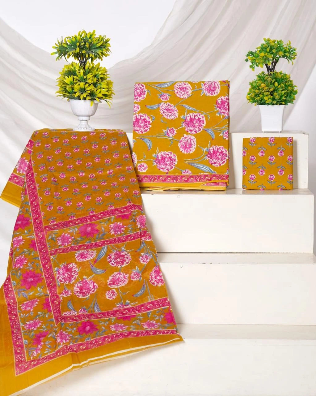 Mango yellow with white, pink, and blue floral prints cotton dress material