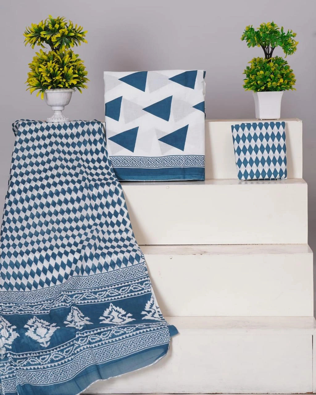 White with light blue triangular prints cotton dress material1