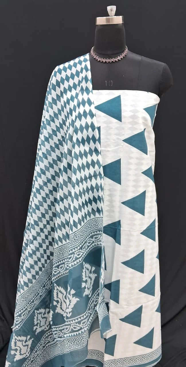 White with light blue triangular prints cotton dress material