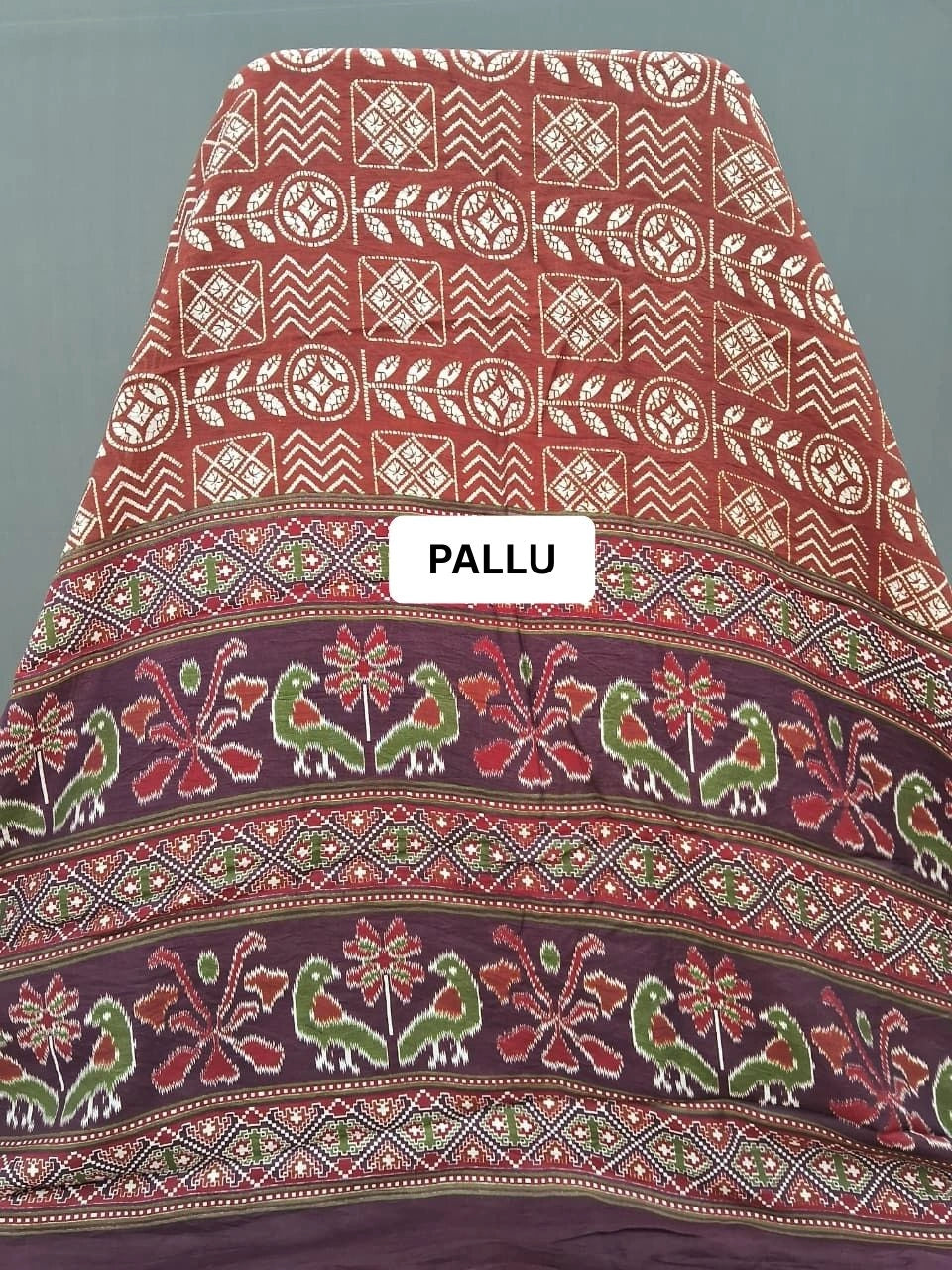 Brick Red Moonga silk Saree with Cream Print Pallu