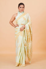 Pista Green Soft Cotton Saree with Orange Flower Print