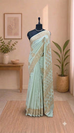 Pista Green Soft Cotton Saree with Orange Flower Print