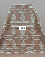 A beige soft cotton saree pallu