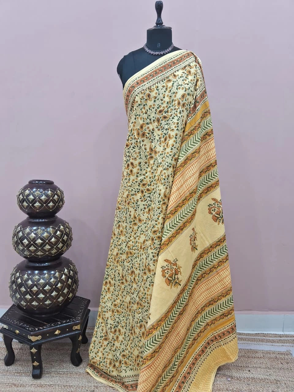 A light yellow soft cotton saree