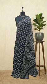 A graceful black soft cotton saree