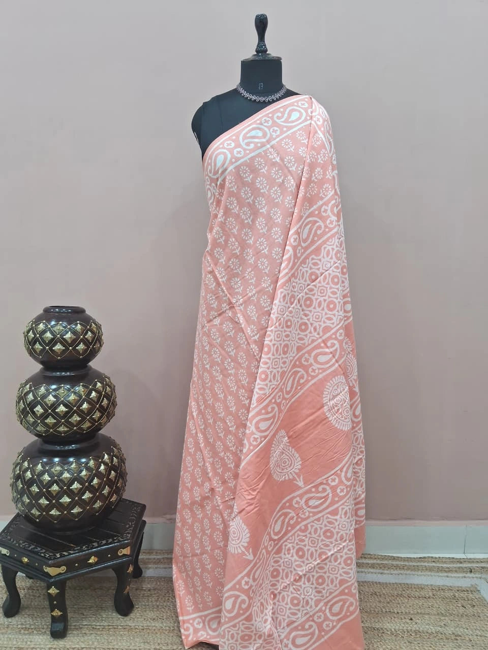A graceful peach soft cotton saree 