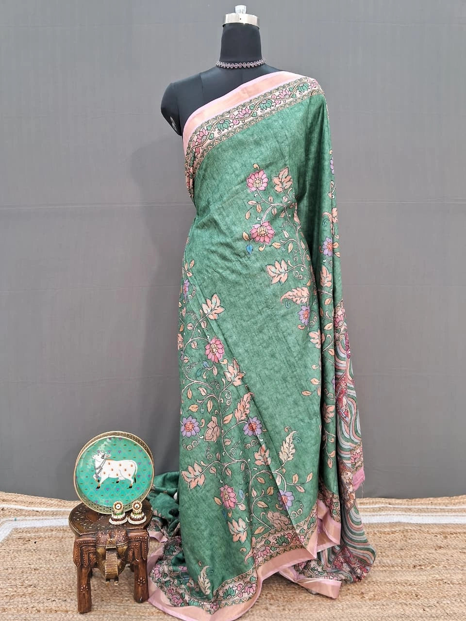 Green semi Tussar saree with a floral print