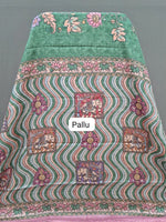 Green semi Tussar saree with a floral print pallu