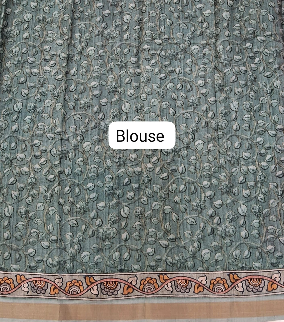 Green semi Tussar saree with a floral print blouse