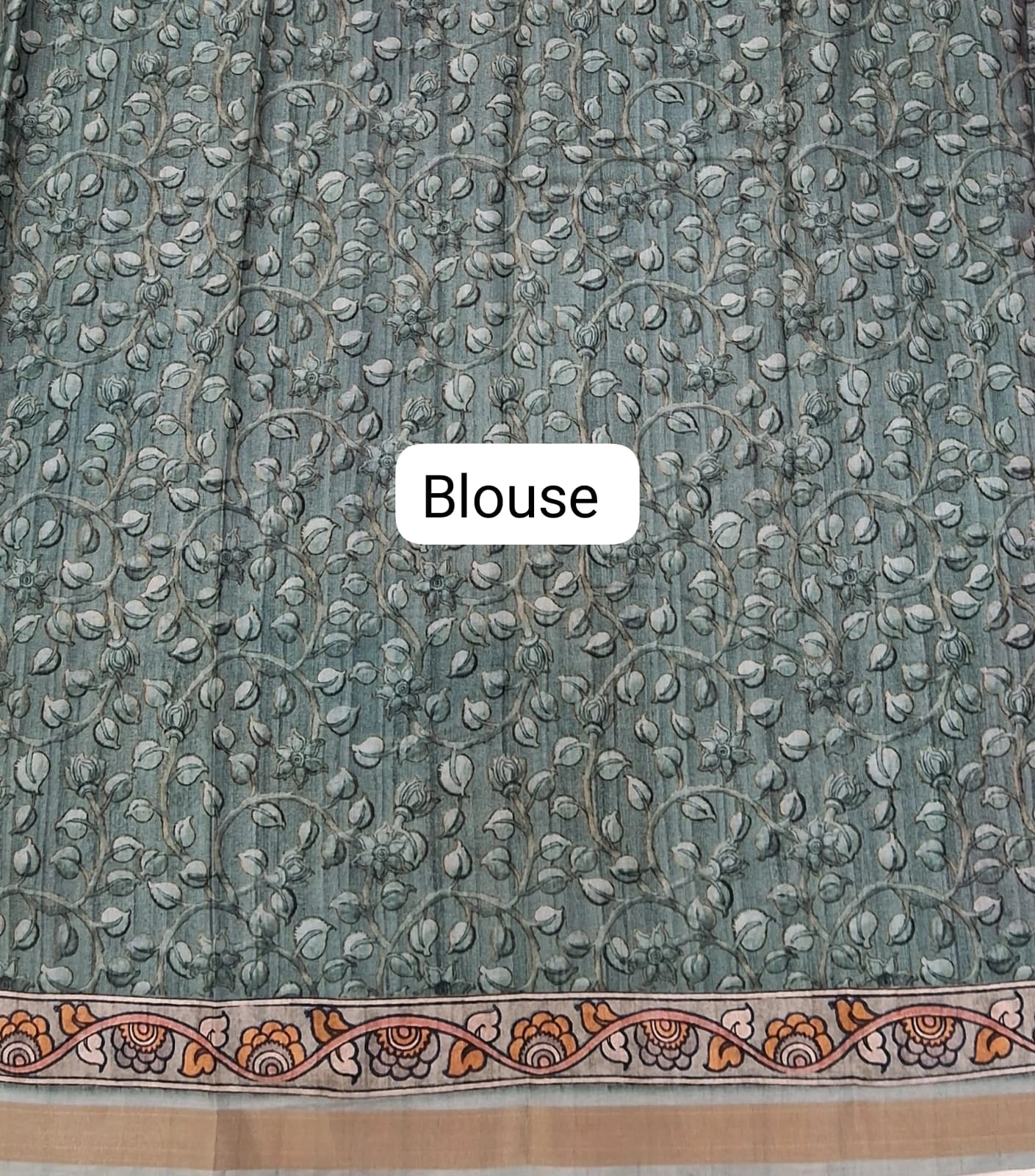 Green semi Tussar saree with a floral print blouse