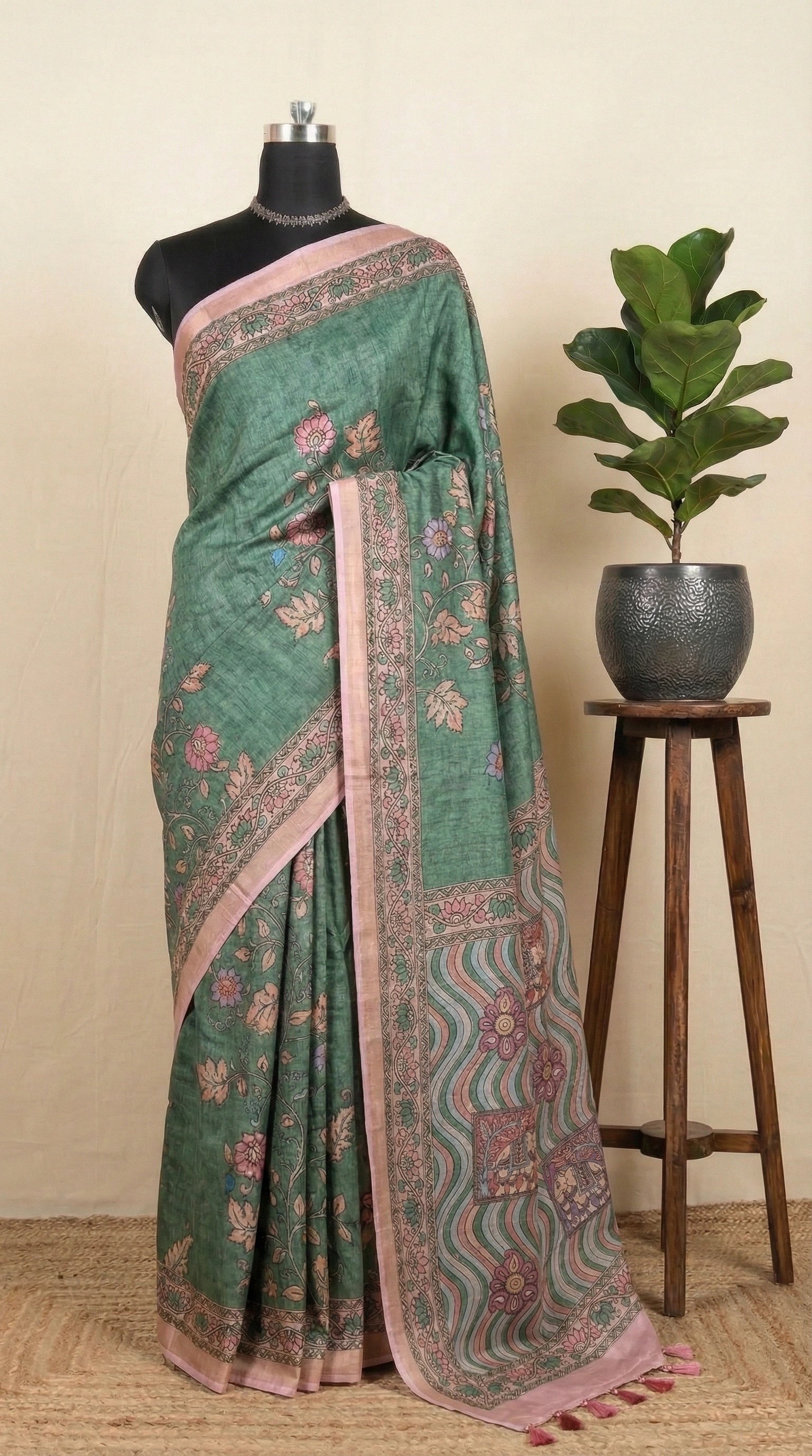 Green semi Tussar saree with a floral print