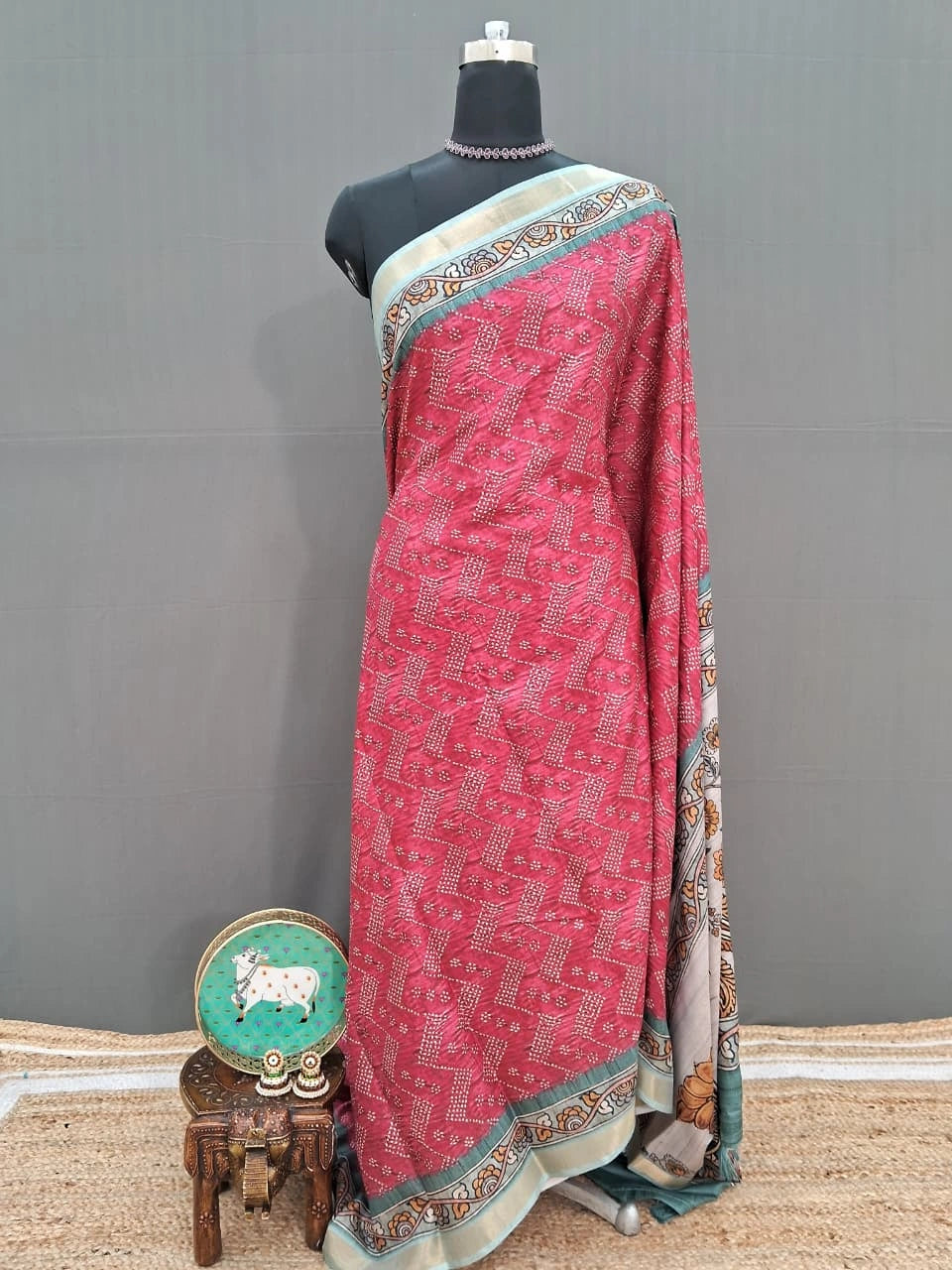 Pink semi Tussar saree with a white bandhani print