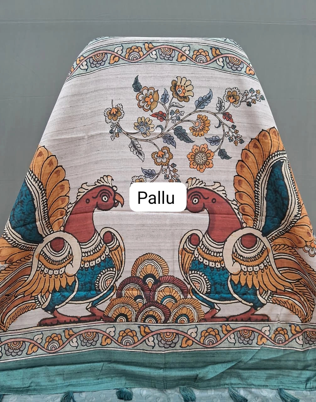 Pink semi Tussar saree with a white bandhani print pallu