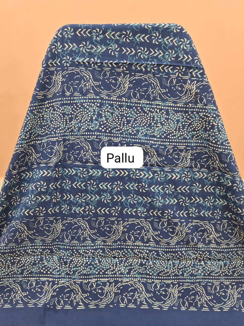 An indigo blue mulmul zari cotton saree pallu