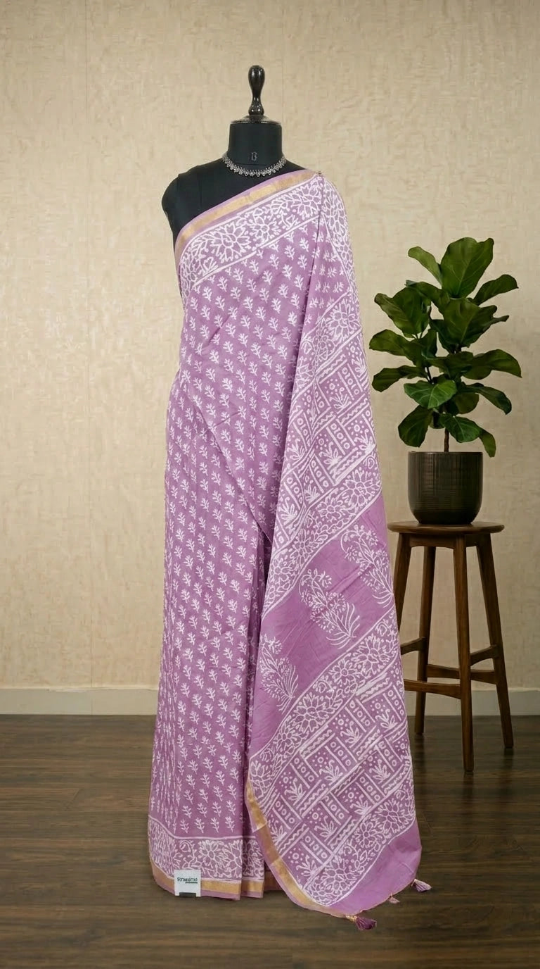 A raspberry pink mulmul zari cotton saree