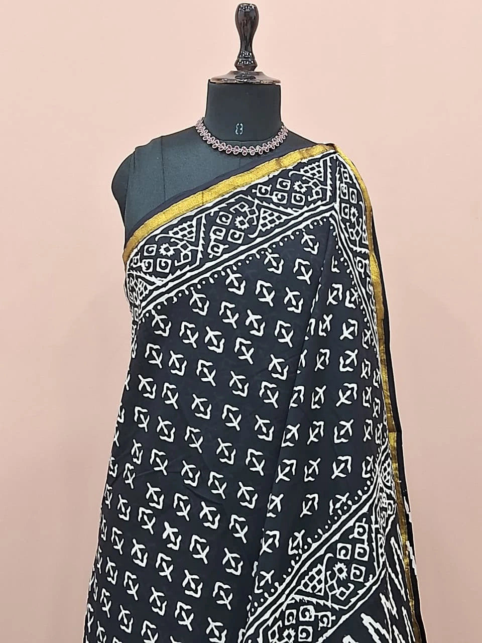 A striking black mulmul zari cotton saree 1